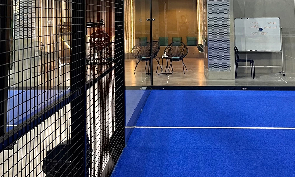 What are padel court walls made of?